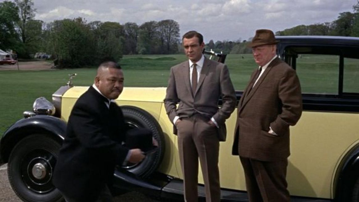 Three blokes and a 1937 Rolls Royce Phantom III.