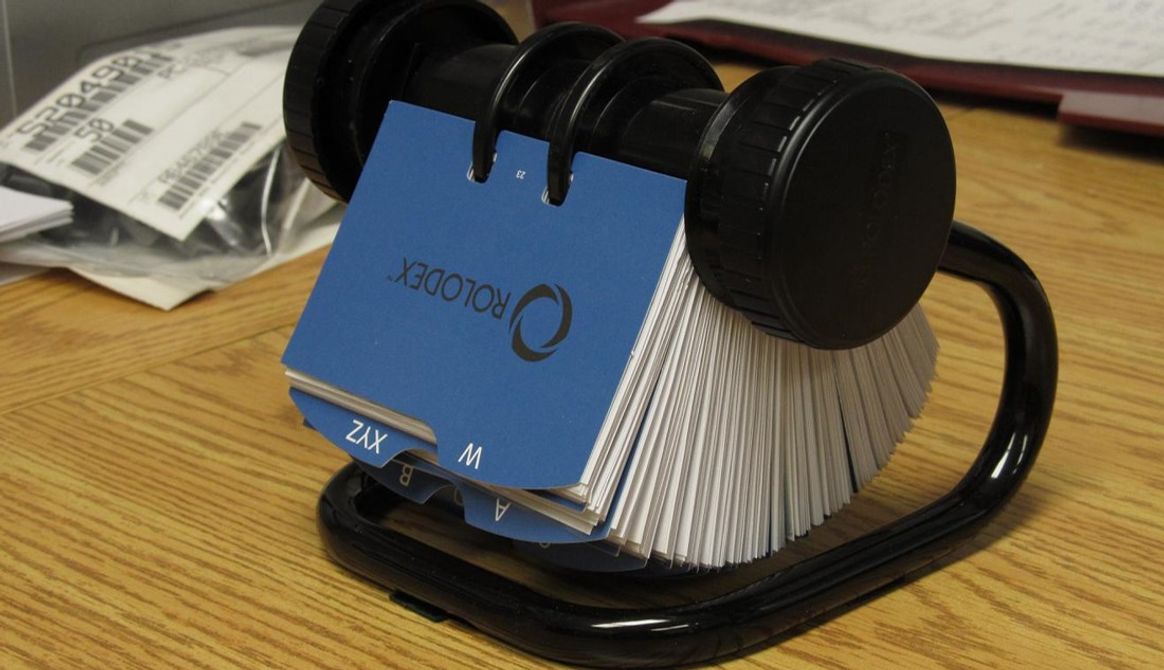Image of a rolodex. The history of expert networks starts with firms collecting large rolodexes.